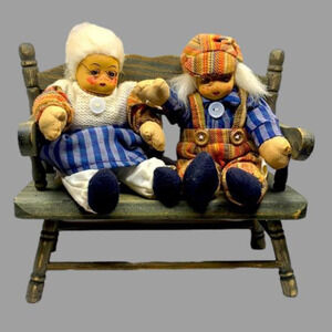 Grandma and grandpa sitting on a wooden bench